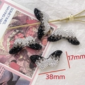 Macro shot of mustache-shaped rhinestone charms for DIY jewelry with 38mm dimension - 1# Moustache - Black Grey White Gradient / 38mmx17mm