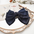 Barrette à cheveux nœud en satin bleu marine avec texture soie sur plateau miroir vintage - Bleu marine