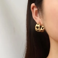Pendientes de aro C en acero inoxidable chapado en oro 18K con corazones calados - Dorado