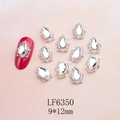 Macro shot of 9x12mm teardrop crystal nail charms with silver alloy and rhinestone inlay - Silver Base Transparent Teardrop (6350)
