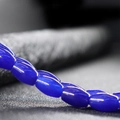 Polished 8x12mm blue agate beads with smooth oval finish for DIY jewelry making - Lapis Lazuli