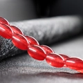 Polished red oval agate beads with translucent crystal finish for DIY jewelry making - Red Jade