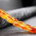 Golden amber agate beads strand for DIY jewelry making in polished round finish - Red Flower