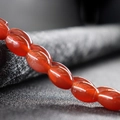 Vibrant red oval carnelian agate bead strand with polished high-gloss finish for DIY jewelry - Agate Red (White Stone)