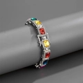 Detailed view of 10mm Cuban chain with multicolored zircon gemstones on a display stand - 8 inch Bracelet (20cm) / Silver Multicolor