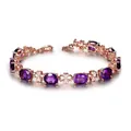 Rose gold bracelet featuring oval purple amethysts and clover links with diamonds - Bracelet