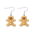 Cartoon gingerbread man earrings with white stripes and red details in a hook style - Resin Gingerbread Man Earrings