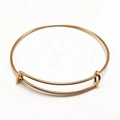 Adjustable golden stainless steel wire bangle featuring a minimalist sliding knot design - KC Gold
