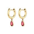 Close-up of gold C-shape hoop earrings with red pear-cut zircon crystal pendants - Red