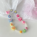 Detail of colorful beaded phone strap with pink tulips, butterflies and faux pearls - Butterfly Flower