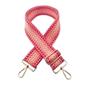 Detail of pink and orange geometric jacquard wide bag strap with gold metal swivel hooks - Pink