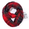 Detail of red and green plaid scarf featuring a practical hidden pocket with cash inside - Pocket Scarf F02