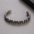 Detailed view of punk gothic skull cuff bracelet in vintage silver stainless steel - Steel Color (KB169331-KJX)