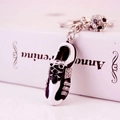 Creative soccer shoe metal keychain with rhinestones and a football charm pendant - Silver