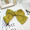 Elegant olive green satin bow hair clip with a smooth metallic sheen finish - Ginger Yellow (Duckbill Clip)