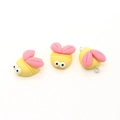 Three cute resin bee pendants with pink wings and yellow bodies for DIY crafts - Ladybug