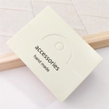 Close-up of cream jewelry display card with hand made accessories text engraving - 8x6cm Yellow Card / 1 Sheet