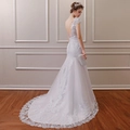 Elegante vestido de novia sirena blanco con cola de encaje y detalle de espalda abierta - US 2 / Blanco