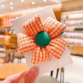 Elastic hair tie for girls with orange checkered floral pattern and green fabric button - Orange Plaid
