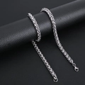 Macro shot of silver wheat chain necklace with lobster clasp on black leather background - 3.0mm*50cm / Steel