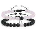 Braccialetti di coppia in quarzo rosa e pietra nera opaca con cuore magnetico su sfondo bianco - Bracciale Quarzo Rosa + Pietra Smerigliata