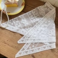 Elegant white lace floral headscarf with hollow design on vintage wooden background - Striped Floral Bandana / White