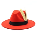 Detail of red wool fedora hat featuring a black ribbon and two striking gold feathers - M (56-58cm) / Orange Red