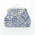 Close-up of Morocco style coin purse with blue tile pattern and silver metal clasp - Blue and White Tile Pattern
