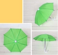 Miniature green umbrella accessory for 18-inch dolls with a white curved handle - Pale Green