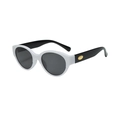 Retro oval cat-eye polarized sunglasses in black and white with gold temple accents - White Frame Black Temples Black Gray Lens