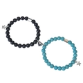 Dettaglio di bracciali di coppia con perle nere e turchesi e chiusura a cuore magnetica - Pietra Opaca + Bracciale in Turchese