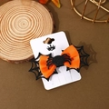 Detail of Halloween spider bow hair clip with orange ribbon and black glitter spider web - Orange Spider