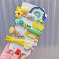 10-teiliges Set bunter Kinder-Haarspangen mit Regenbogen- und Fruchtmotiven auf Karte - Gelb