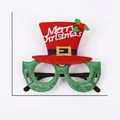 Green Christmas glasses with red sequin hat decor and white Merry Christmas text details - Red Santa Hat Merry Christmas Glasses