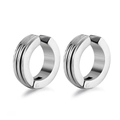 Close-up of silver titanium steel ear clips with minimalist triple-line circular design - Single Piece / Silver