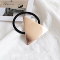 Geometric rose gold triangle metal hair tie with black elastic band on linen - Metal / Triangle Rose Gold