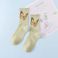 Light green crew socks in combed cotton featuring a yellow butterfly pattern embroidery - One Size / Green