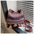 Ethnic style crossbody bag with colorful woven geometric patterns and fringe tassel - Brown