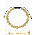 Handmade woven citrine beaded bracelet on a decorative card with a yellow crystal design - Citrine Bracelet