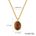 Élégant collier en acier titane doré avec un pendentif ovale en pierre oeil de tigre - P1957 Collier Ovale Oeil de Tigre Or