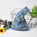Detail of a Japanese style cotton linen knot bag featuring ethnic geometric patterns - Blue Ethnic Style