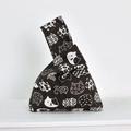 Detailed close-up of dark brown linen wrist bag with white cat patterns in Japanese style - White Cat on Coffee