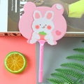 Pink cartoon rabbit and strawberry fan ballpoint pen on aesthetic stationery background - White Rabbit Bear Pink