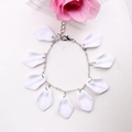 Detail of silver chain bracelet with white petal charms and lobster clasp closure - White - Bracelet