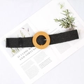 Close-up of black woven belt with a large round brown buckle on a lifestyle background - Big Round Buckle Black