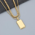 Detail of layered gold stainless steel necklace with square pendant and snake chain - Gold