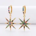 Golden starburst earrings with colorful zircon stones in a vibrant asymmetric design - Eight-pointed Star