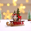 Christmas wooden sleigh decor with Santa and reindeer on a warm bokeh background - Santa Claus