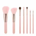 Close-up of 7-piece pink makeup brush set with rose gold ferrules and fiber bristles - 7Pcs Set / Girl Pink