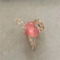 Dettaglio molletta per capelli a cuore rosa in plastica trasparente con glitter - Taglia Piccola / Champagne